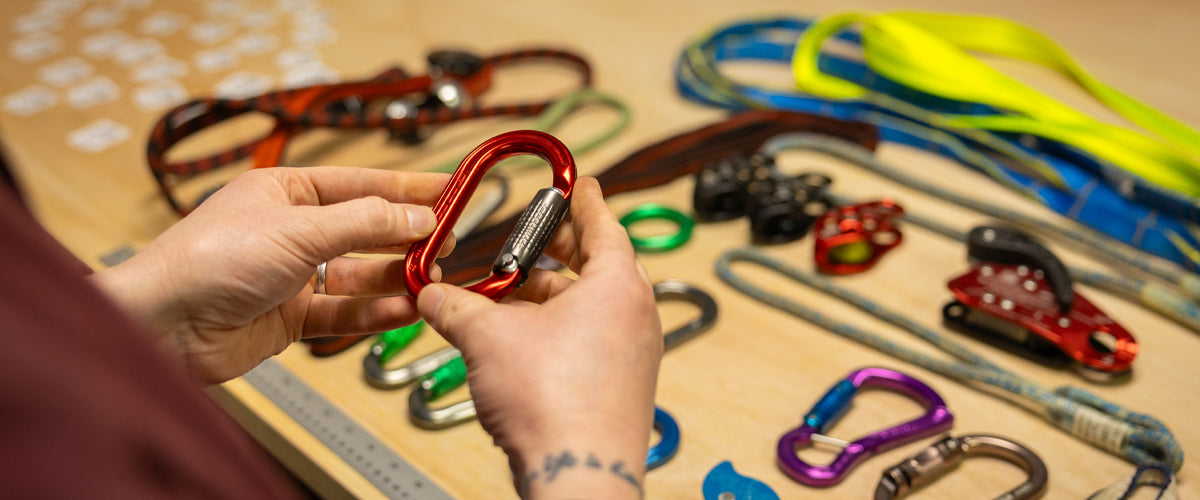 Man holding carabiner