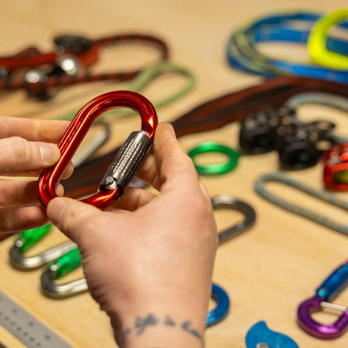 Man holding carabiner